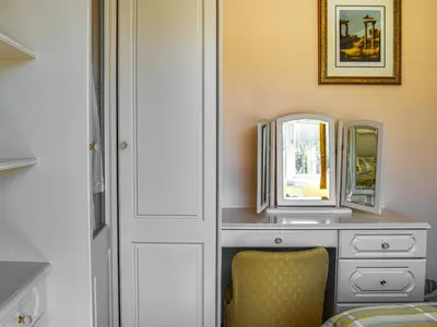 a dressing room with a desk with two mirrors at Teazles in Peel