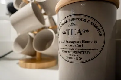 a cup of tea sitting on a table at Gingerbread Nook in Grasmere