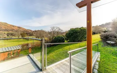 a view from the balcony of a house at Le Tholonet in Grasmere
