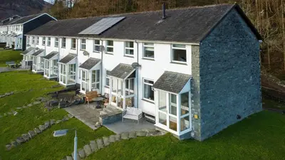an aerial view of a large white house at Number One in Chapel Stile