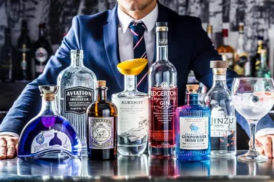 a man sitting at a bar with bottles of alcohol at Inn on the Square in Keswick