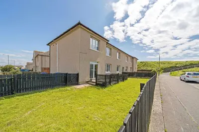 a house with a fence on the side of the road at Royal Troon Golf Let in Troon