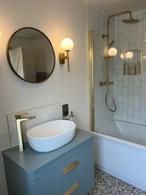 a bathroom with a sink and a tub and a mirror at Firth View 2 - Country Escape with Sea Views of Arran! in Ayr