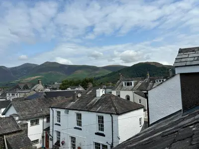 a view of a town with mountains in the background at Lillibet Cottage in Keswick
