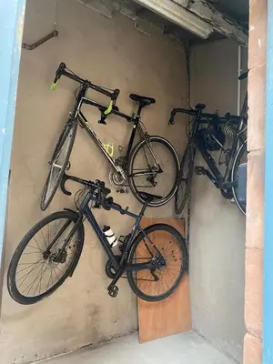 two bikes are hanging on a wall at Cumberland House in Cockermouth