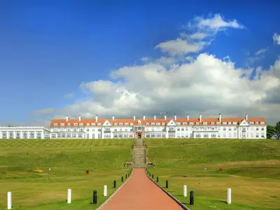 a large white building with a red roof at Lundin Links - Ukc6916 in Turnberry
