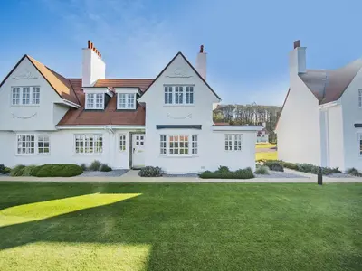 a large white house with a green lawn at Royal Aberdeen - Ukc6917 in Turnberry