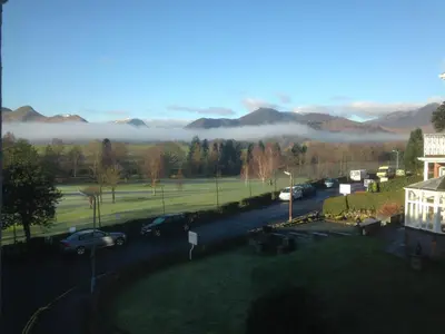 a view of a street with cars parked in a parking lot at Laurel Bank Guest House in Keswick