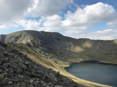 a view of a mountain with a lake in the foreground at Helvellyn Room With View - Double or twin in Penrith