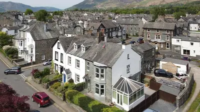 an aerial view of a town with houses and a street at Mansefield, Keswick - Sleeps 6 in Keswick