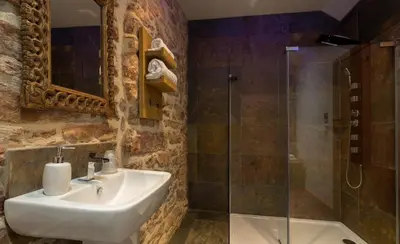 a bathroom with a sink and a shower at Gosforth Hall Inn in Gosforth