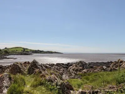 a view of the ocean from a rocky beach at Seascape in Dalbeattie