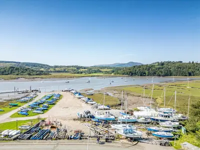 a bunch of boats are docked in a marina at Anthony House in Kippford