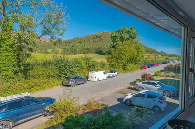 a view of cars parked in a parking lot at Brundholme House in Keswick