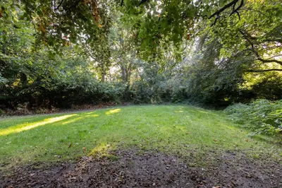 a field of grass with trees in the background at Host & Stay - Chatsworth Townhouse II in Carlisle