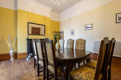 a dining room with a table and chairs at Host & Stay - Chatsworth Townhouse II in Carlisle