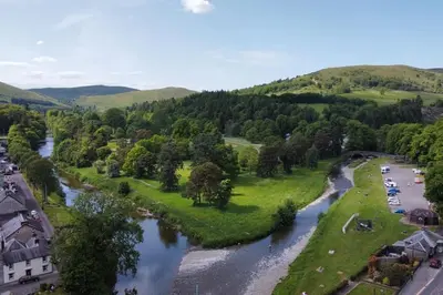 an aerial view of a river in a town at Luxurious Georgian Town House in Langholm
