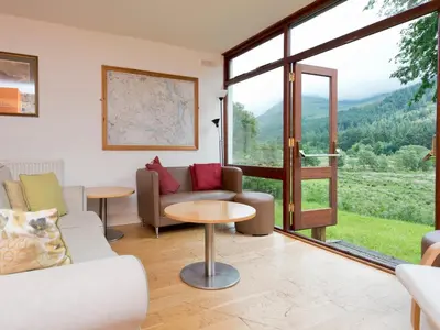 a living room with a couch and a table at YHA Ennerdale in Buttermere