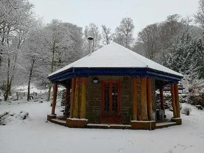 a small building with snow on top of it at The Dairy - Patterdale Hall in Penrith