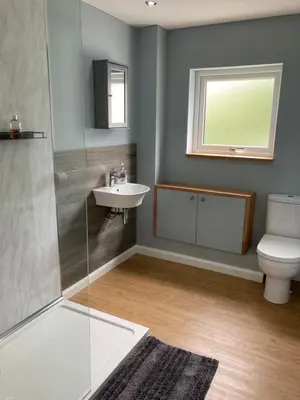 a bathroom with a sink and a toilet at 2 Bed seafront cottage in Portpatrick in Portpatrick
