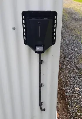 a box on the side of a white wall at Garlies Lodge in Bargrennan