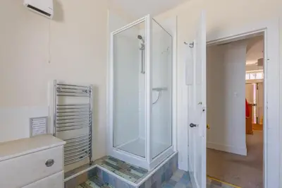 a bathroom with a walk in shower and a walk in shower at 3 Bed in Drummore oc-k30214 in Drummore