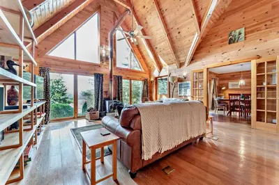 a bedroom with a bed in a room with wooden ceilings at 3 Bed in Kippford oc-g30100 in Kippford