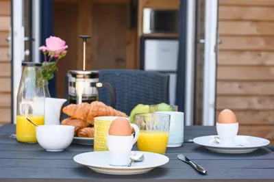 a table with eggs and breakfast foods on it at Ivy in Whithorn