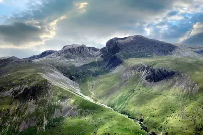 an aerial view of a mountain with a valley at Modern Junior Suite, Seascale, Cumbria in Seascale