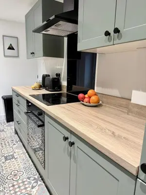 a kitchen with a bowl of fruit on a counter at Workington Home - Working - Visiting the Lakes in Workington