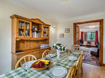 a dining room with a table with fruit on it at 3 Bed in Wigton oc-95374 in Uldale