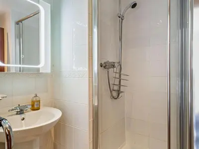 a bathroom with a shower and a sink at 3 Bed in Wigton oc-95374 in Uldale