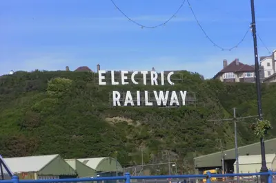 a sign that says electric railway on a hill at isle of man holiday apartment in Douglas