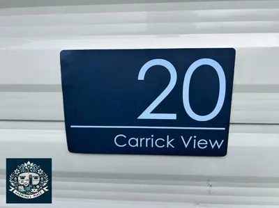 a sign that reads carrick view hanging on a wall at Jazmine's Place in Ayr