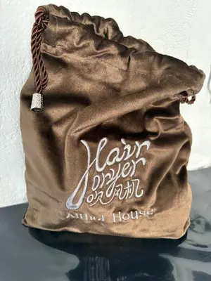 a brown bag with the words harry fulleranimal house at Athol House in Douglas