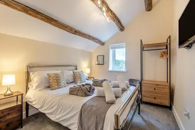 a bedroom with a large bed in a room at 3 Bed in Isel oc-i30816 in Sunderland