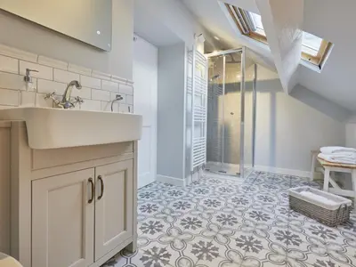 a bathroom with a sink and a shower at 5 Bed in Cockermouth oc-sz424 in Lorton
