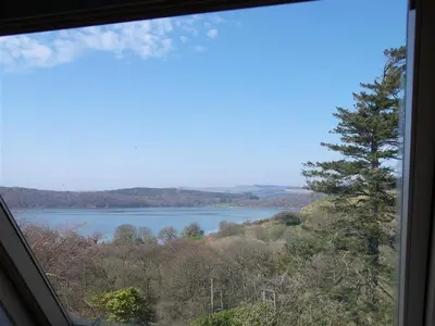 a view of a lake from a window at Lonsdale in Rockcliffe