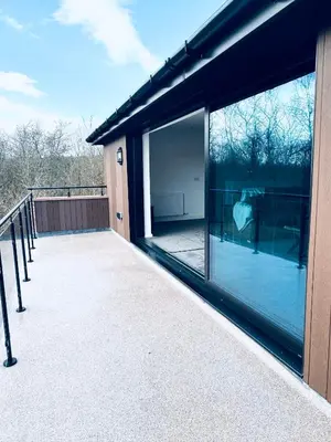 a large glass window on the side of a house at Silverbirch Cottage - 3 Bedrooms - Sleeps 6 in Frizington