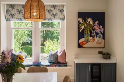 a dining room with a window and a table at Leathes Head Country House in Keswick
