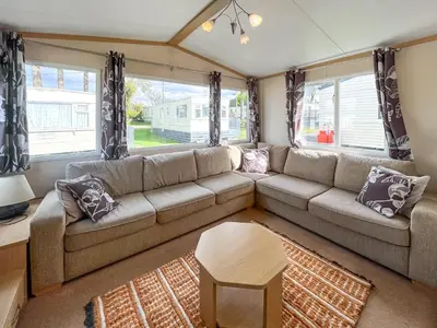 a living room with a couch and a table at The Haven in Cockermouth