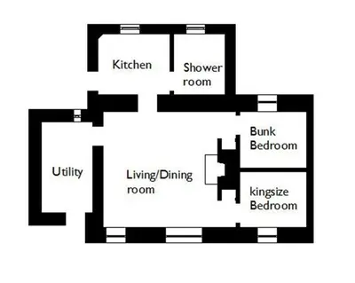 an illustration of a floor plan of a house at Threaby Cottage in Girthon