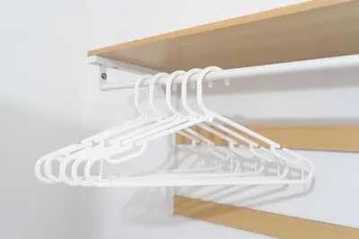 a bunch of white kitchen utensils on a shelf at Open House in Carlisle