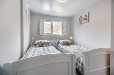two beds in a small room with two beds at 2 Bed in Braithwaite oc-p31730 in Braithwaite