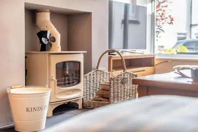 a kitchen with a wood stove in a room at 2 Bed in Braithwaite oc-p31730 in Braithwaite
