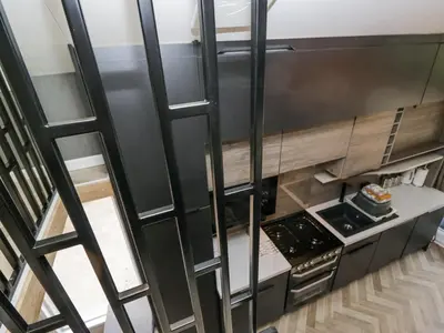 an overhead view of a kitchen with a stove at Dubs Luxury Family Pod in Keswick