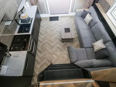 an overhead view of a living room with a couch at Woof Luxury Family Pod in Keswick