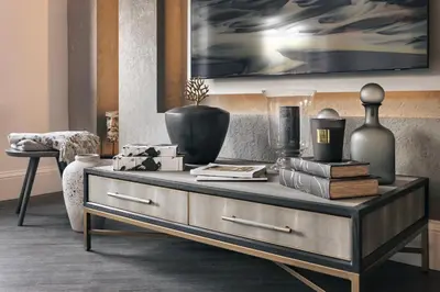 a living room with a coffee table with a table at The Sanctuary - Ridgestone in Watermillock