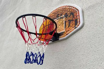 a basketball hoop hanging on a wall at Secluded Hot Tub, Pool, Escape in Bootle
