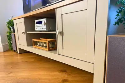 a white cabinet with a tv on top of it at Secluded Hot Tub, Pool, Escape in Bootle